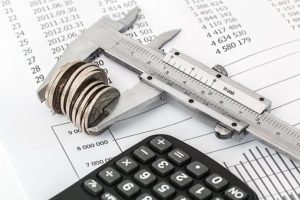 calculator and coins